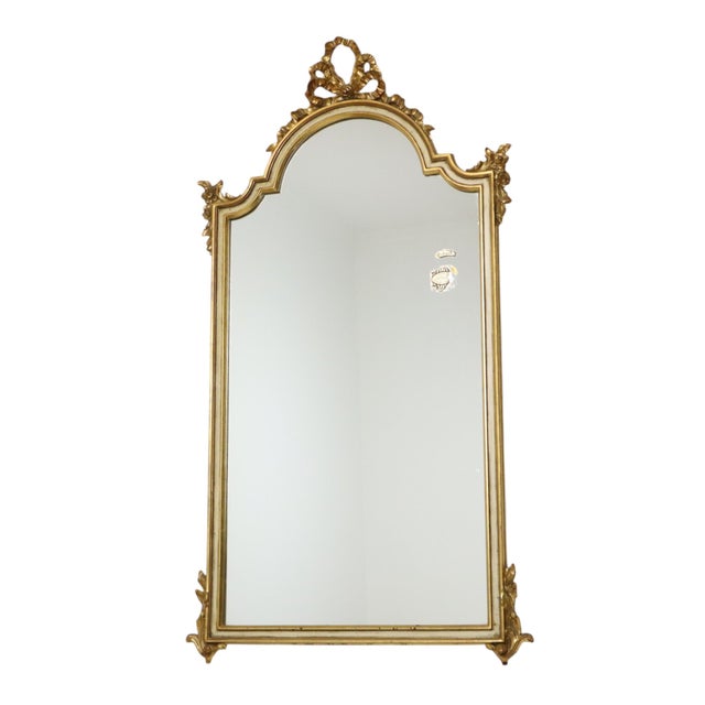 Beautiful large classic mirror, classic crested mirror, with a gold-leaf gilded frame made of resin, extensively decorated...