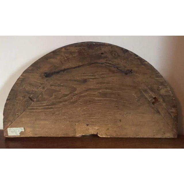 Antique 18th century French Louis XVI crescent shaped carved and gilt wood transom mirror for over a door or passage....