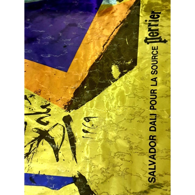 Salvador dali - perrier - vintage lithographic poster on golden paper signed in the plate 1970 dimensions: 60 x 42 cm...