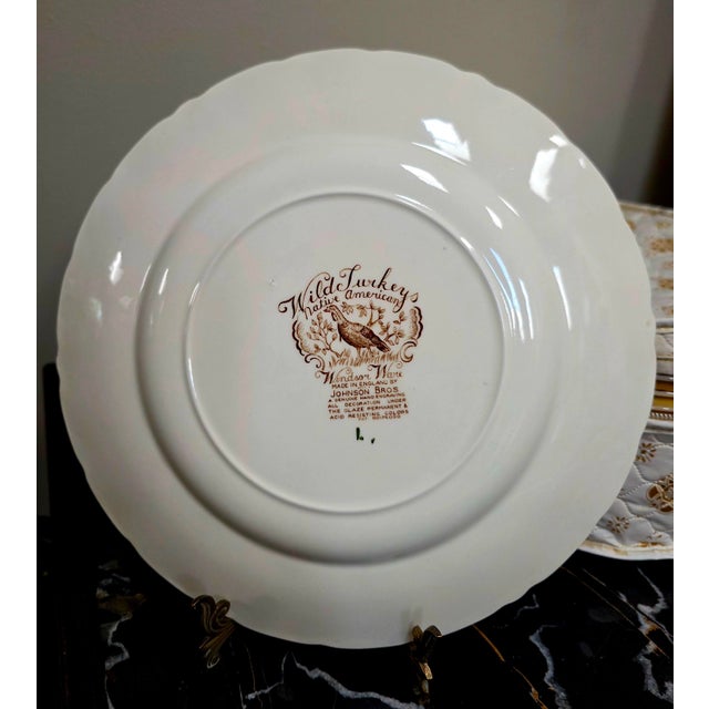The Johnson Bros. Wild Turkeys Native American set of 14 dinner plates features a beautiful turkey pattern in white,...