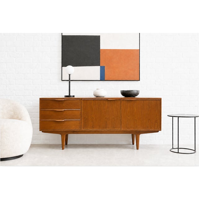 Sculptural + Funky Mid Century Modern styled Credenza / Media Stand with loads of storage space in the three deep +...