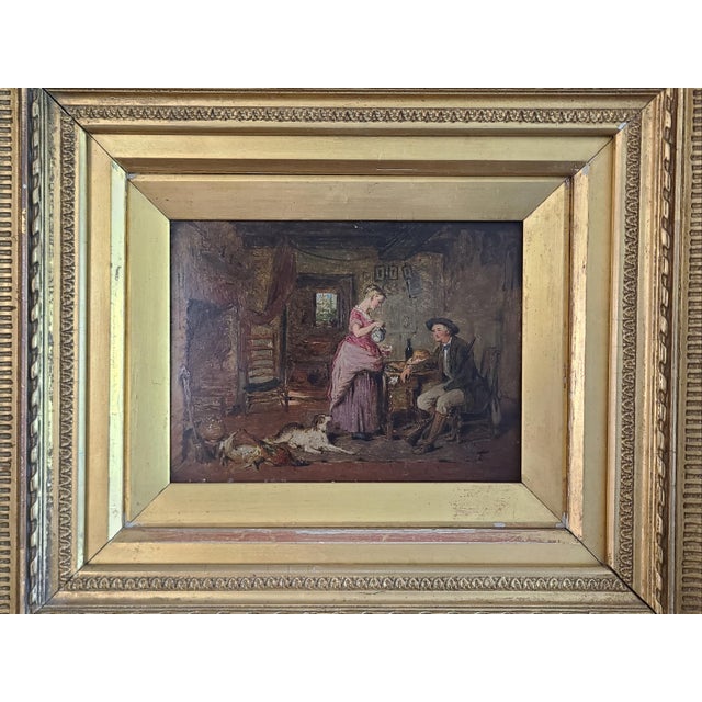 Small and charming late 19th century oil painting depicting a rustic cottage interior with a husband, wife and dog. The...