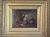 Small and charming late 19th century oil painting depicting a rustic cottage interior with a husband, wife and dog. The...
