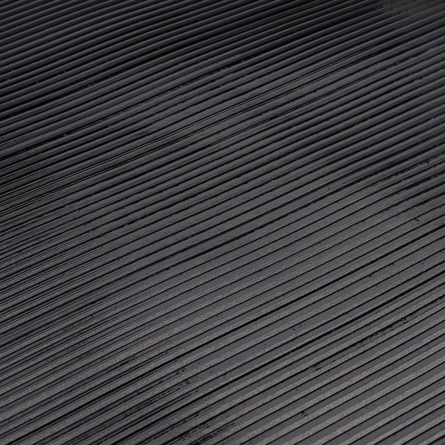 Created by hand, Rimini Rib is a lustrous metallic wallcovering with a pronounced corded texture. A wash of color...