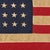 This vintage American flag is made from a cotton cloth with fully sewn stars and stripes. Please note overall staining,...