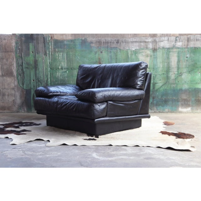 This is a sofa, suited for your on point, stylish, cutting edge setting. It's shape is sculptural and the leather grain is...