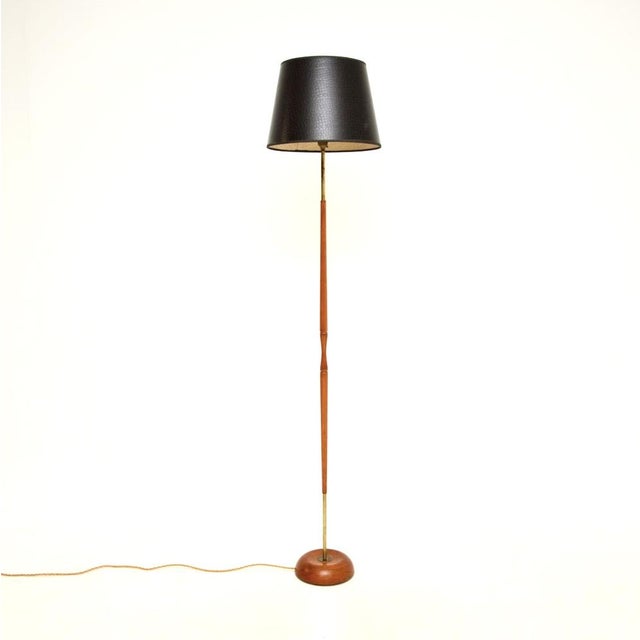 A very stylish and well made Danish vintage teak and brass floor lamp, dating from the 1960’s. This has an amazing design,...