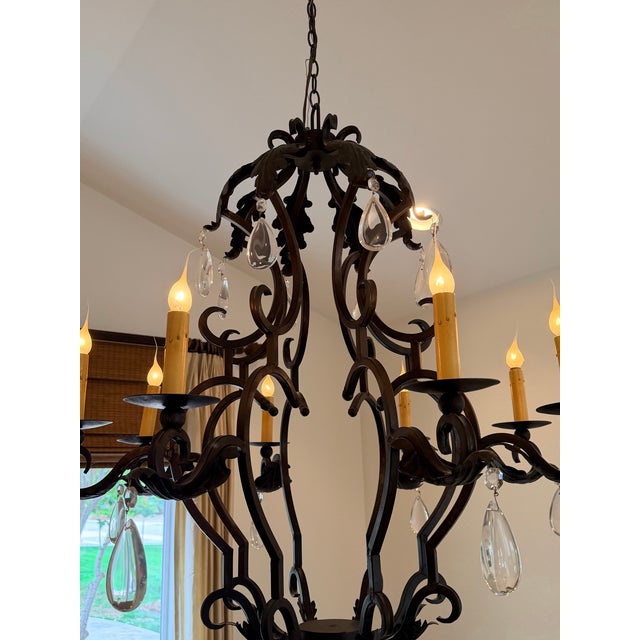 Create a dramatic focal point with this substantial Gothic Revival-inspired chandelier, featuring an intricately crafted...