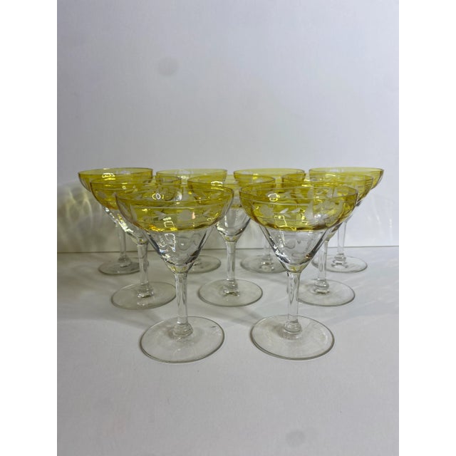 Extremely rare matching set of 9 yellow to to clear hand etched cocktail glasses.
