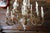 Stunning vintage Italian 18-light chandelier dating to circa 1970s, featuring an elaborate combination of hand-carved wood...