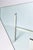 Rectangular 1970's polished steel base coffee table with new glass top.