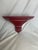 These wall brackets would be perfect for adding some color and detail into your space. The wood is sturdy and the red...
