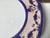 This set of twelve dinner plates are Royal Doulton, a renowned English ceramic and home accessories manufacturer. The mark...