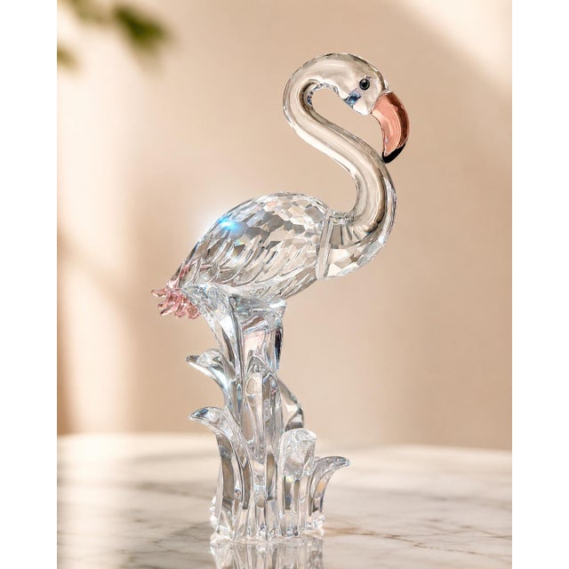 Authentic Swarovski Crystal Flamingo figurine featuring beautifully faceted clear crystal with delicate pink accents. A...