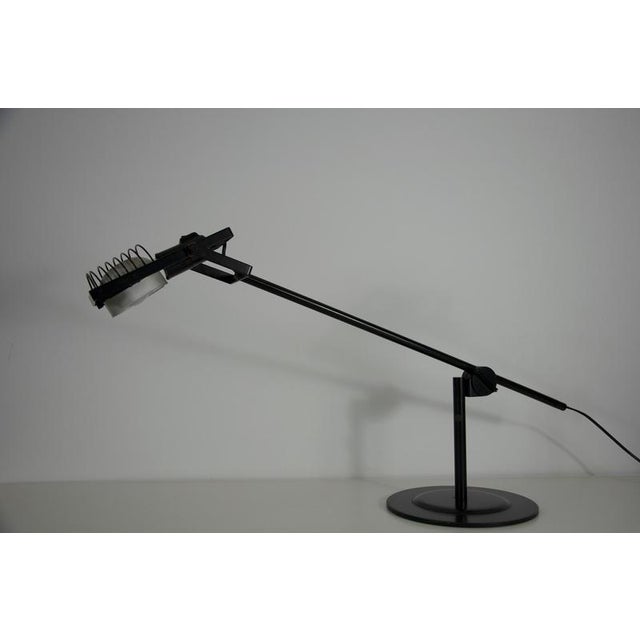 This table lamp, designed by ernesto gismondi for artemide in italy during the 1970s, is a fine example of mid-century...