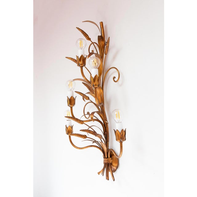 A very striking piece with 5 light points for e14 small screw bulbs. dimensions: h 73 cm, l 39 cm, d 22 cm. up to 250v...