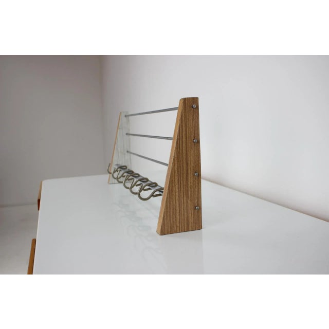 -Made in Czechoslovakia -Manufacture of metal, wood, imitation wood sides -Wall coat hanger with 6 hooks.