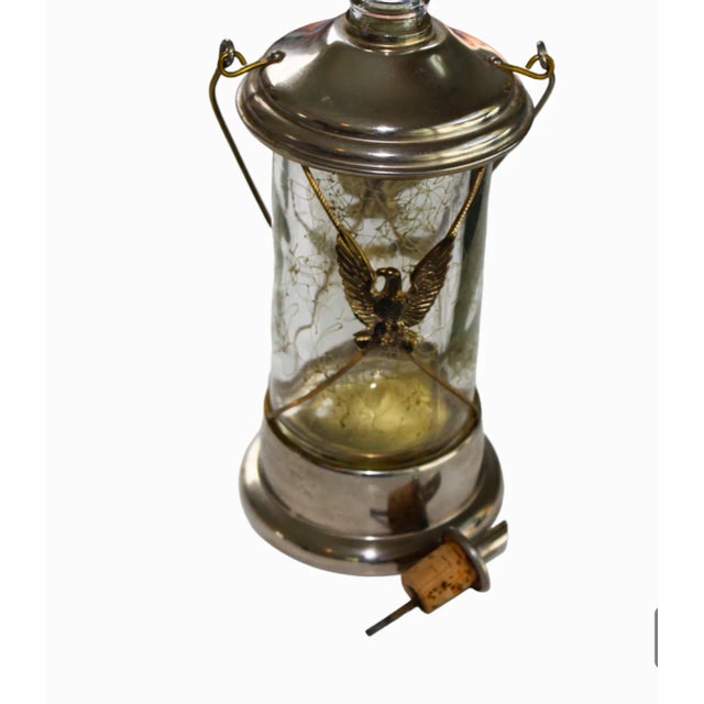Lantern style vintage bar decanter with eagle motif that is also a music box. Fun piece to add to your bar or bar cart....