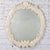Marvelous vintage Art Deco or Art Nouveau large distressed off-white painted plaster round wall mirror with anthemion,...