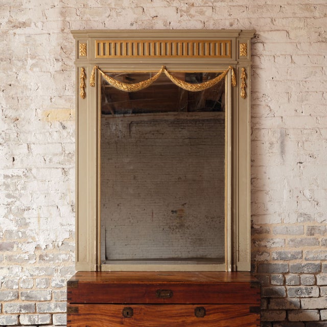 Add refined neoclassical elegance to your space with this late 19th century French Louis XVI style gilt mirror, a...