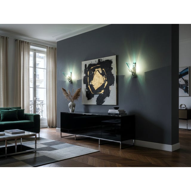 This pair of authentic icaro wall lamps, designed by the visionary carlo forcolini for artemide in the 1980s, represents a...