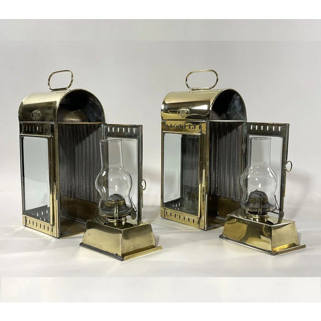 Pair of top quality solid brass ships lanterns with oval makers badges from Davey and Company of London, England. This...