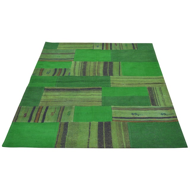 Hand-knotted with care using traditional rug-making techniques, this wool rug blends timeless craftsmanship with a modern...