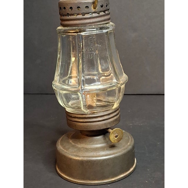 Up for consideration is a fine vintage early 20th-century Perkins Marine Lamp Corp. "Perko Wonder Junior" Skater's...