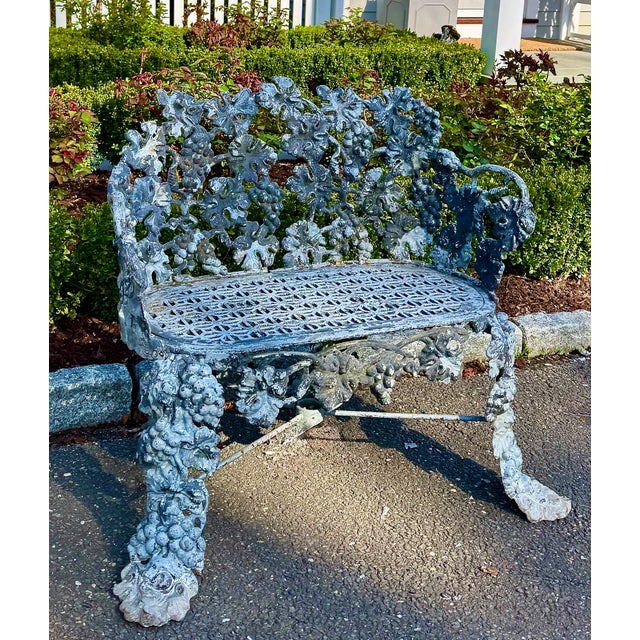 A beautifully detailed antique cast iron garden bench in the classic “grapevine” pattern, marked John McLean NY, circa...