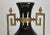 Tall Neoclassic Style Heavy Ceramic Black Colored Vases/Urns Mounted to Round Brass Bottoms Accented by Extended Brass Handles - A Pair For Sale - Image 6 of 12
