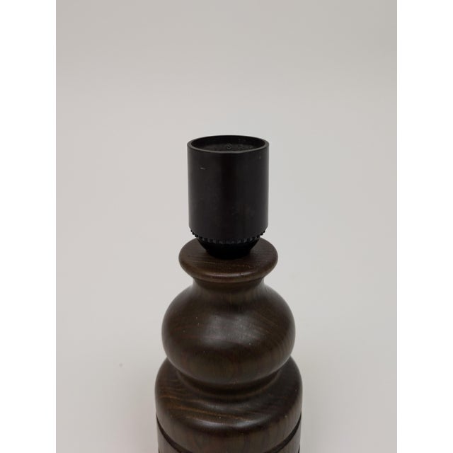 A stained wood table lamp designed and produced in Sweden, c. 1970s.