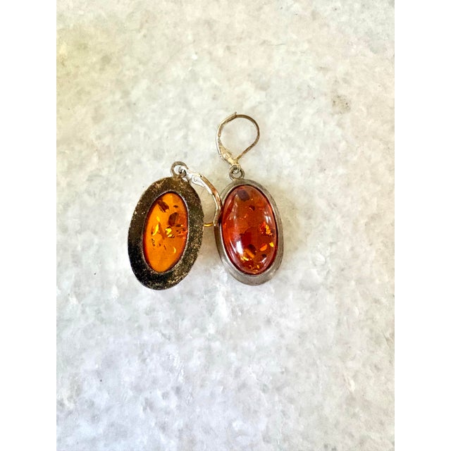 Lovely vintage sterling silver and Amber dangle earrings.