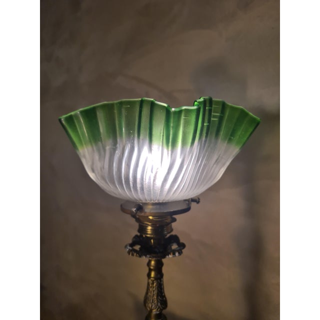 Italian Brass Lamp with Tulip Shade, 1900s, in Very Good conditions. Designed 1890 to 1919 European Plug (up to 250V).The...