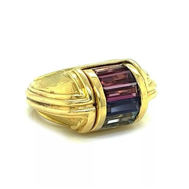 This is an eye catching authentic ring by Nouvelle Bague, crafted from 18k yellow gold featuring high dome shape bridge...