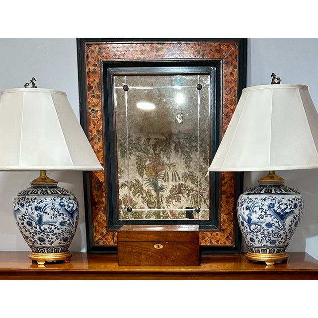 Pair of substantial Ralph Lauren porcelain ginger jar lamps featuring hand-decorated blue and white chinoiserie motifs...