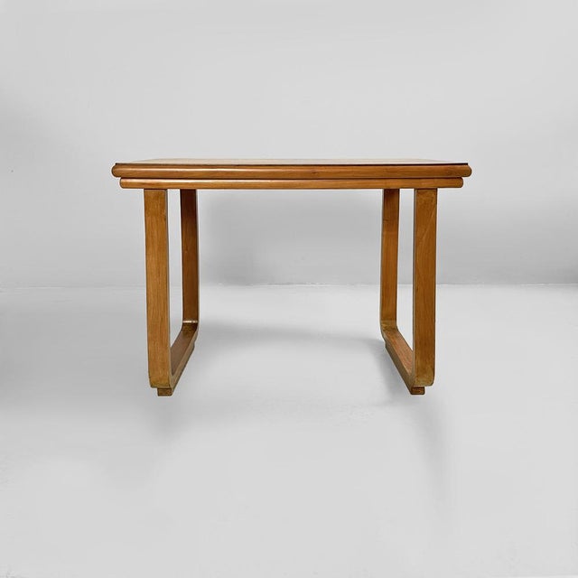 Italian Art Deco rectangular wooden coffee table, 1940s Coffee table with a rectangular, all-wood top. The top features...