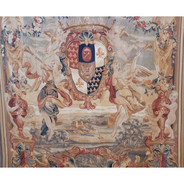 This is a magnificent 20th-century tapestry measuring approximately 82 × 66 inches. The central composition features two...