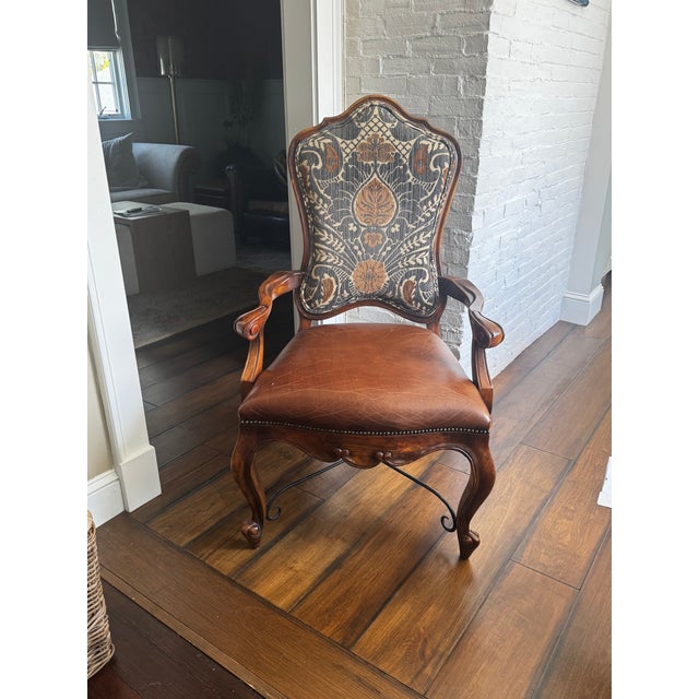 Set of 12 John-Richard custom dining chairs (2 captain's chairs 10 armless). Designer fabric, acacia and oak. They have...