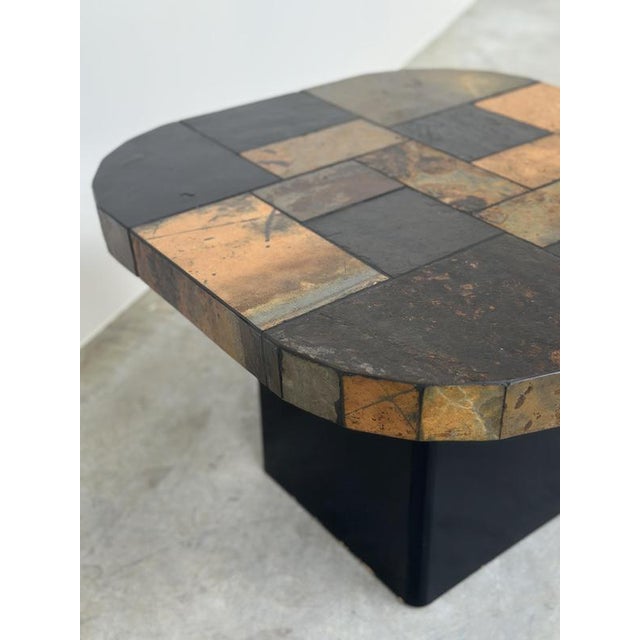 • Width: 70 cm (27.6") • Depth: 70 cm (27.6") • Height: 48 cm (18.9") A striking vintage mosaic slate coffee table dating...