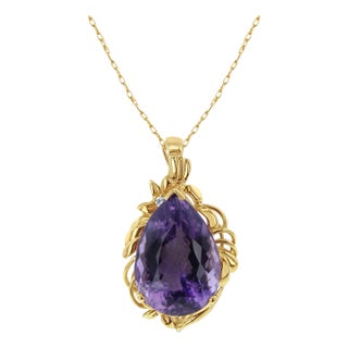 Pear Shaped Amethyst Pendant with Gold Design For Sale