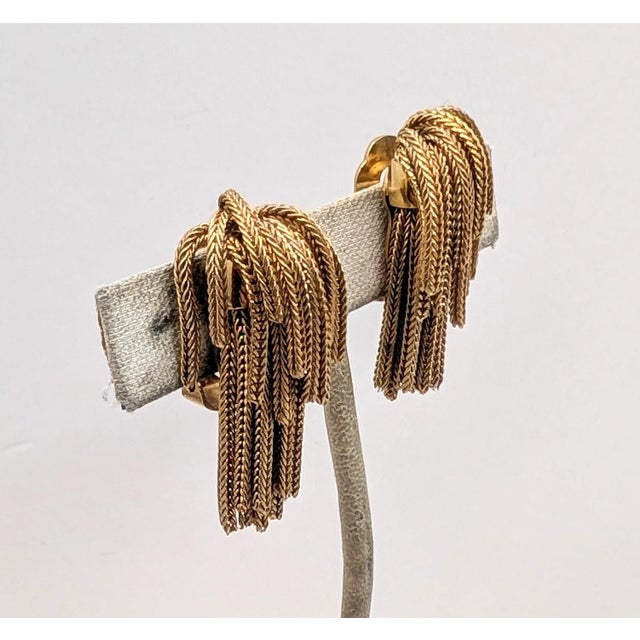 1950s goldtone fringe of goldtone chains clip earrings. Marked "NAPIER PAT. PEND." Measure: 1 3/8 inches long by 7/8...