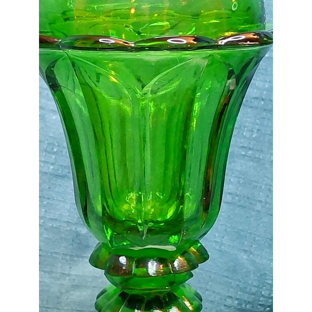Offering a magnificent and exceptionally rare matching pair of mid-19th-century composite whale oil lamps. These lamps...
