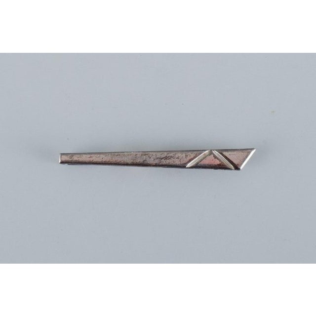 A collection of ten Danish tie pins in sterling silver and gold-plated metal. Modernist design. Mid-20th century. In...