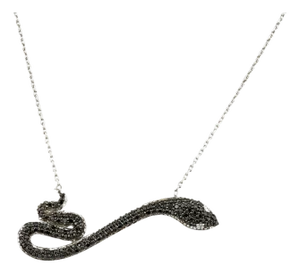 Natural diamond 0.56cts Snake pendant in 18k gold