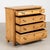 19th century Danish chest of four drawers, crafted in pine with a warm waxed finish that highlights the natural variation...