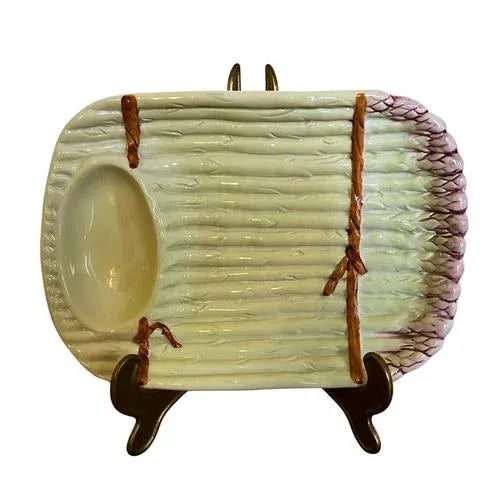 A charming Italian Majolica asparagus dish, beautifully hand-painted in a trompe-l’œil style to mimic a bundle of fresh...
