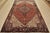 This authentic vintage, traditional, tribal Heriz rug is hand-knotted with an all-wool pile on a cotton foundation. This...