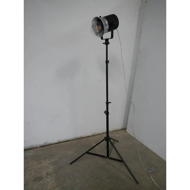 This tripod lamp is produced by IFF Manfrotto. This piece has an attribution mark, I am sure that it is completely...