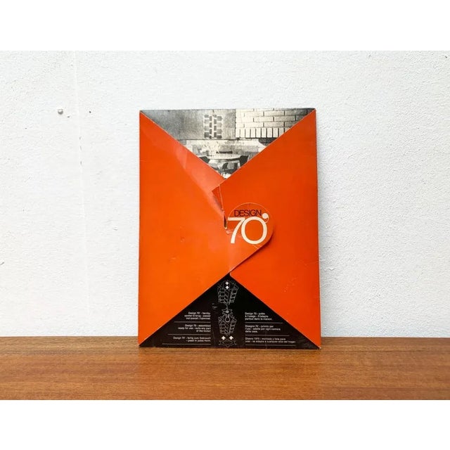 Foldable Space Age pendant lamp from the 1970s after a design by Gunner Jensen. Here still brand new in the original...