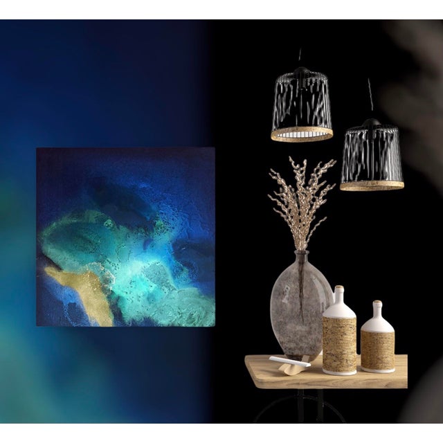 Glow Within features a mesmerizing interplay of deep blues and vibrant greens, evoking a sense of tranquility and depth....